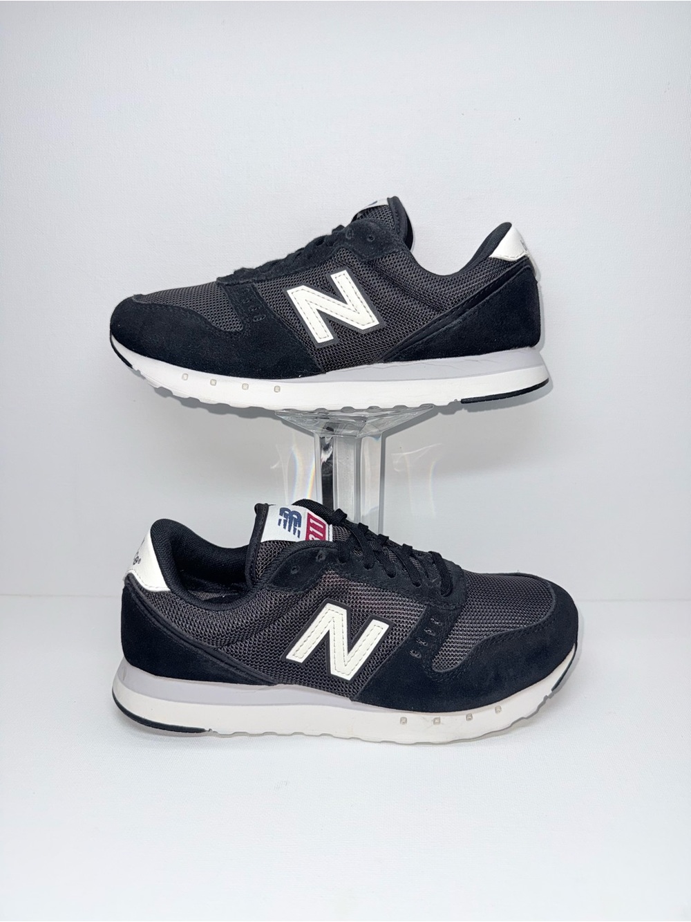 New Balance 311/ Black and White Retro Runner Sneakers